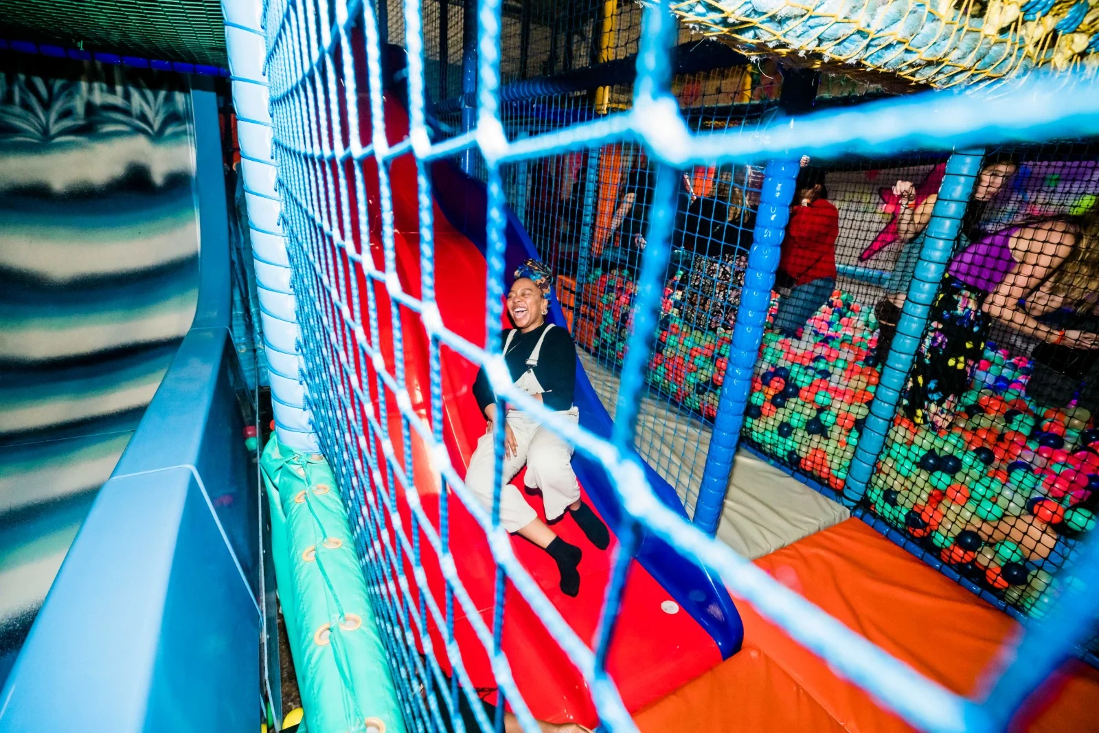 Coming down the soft play slide
